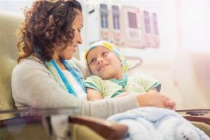 677-07787406 © Masterfile Royalty-Free Model Release: Yes Property Release: Yes Mother hugging daughter (6-7) in hospital